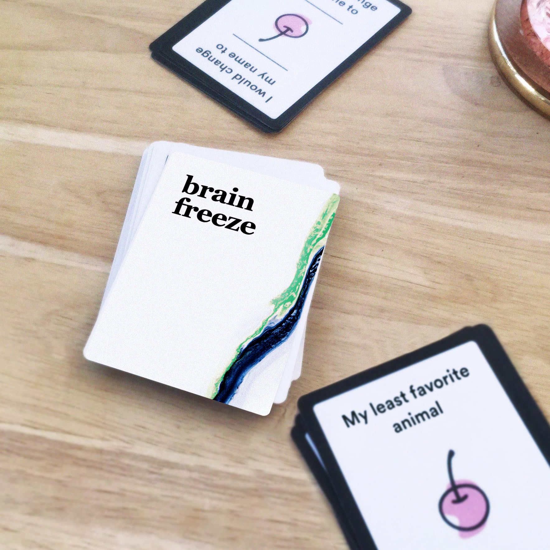 Brain Freeze Party Game - The Hilarious Speak-Before-You-Think Family Card Game for White Elephant Parties, Stocking Stuffers and Board Games Night with Your Friends